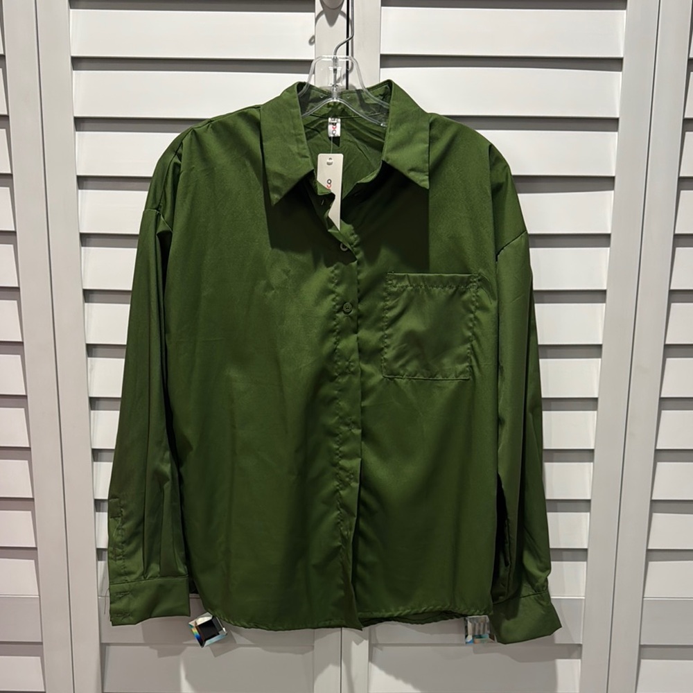 Order Plus NWT Green Button-Up Shirt with long sleeves.